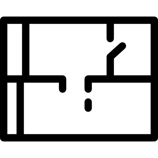 Excavation site showing concrete foundation work for a construction project.